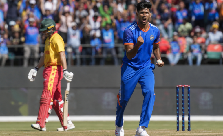 Mayank Yadav celebrates after taking the first wicket during the India vs Zimbabwe 1st T20I in Harare.
